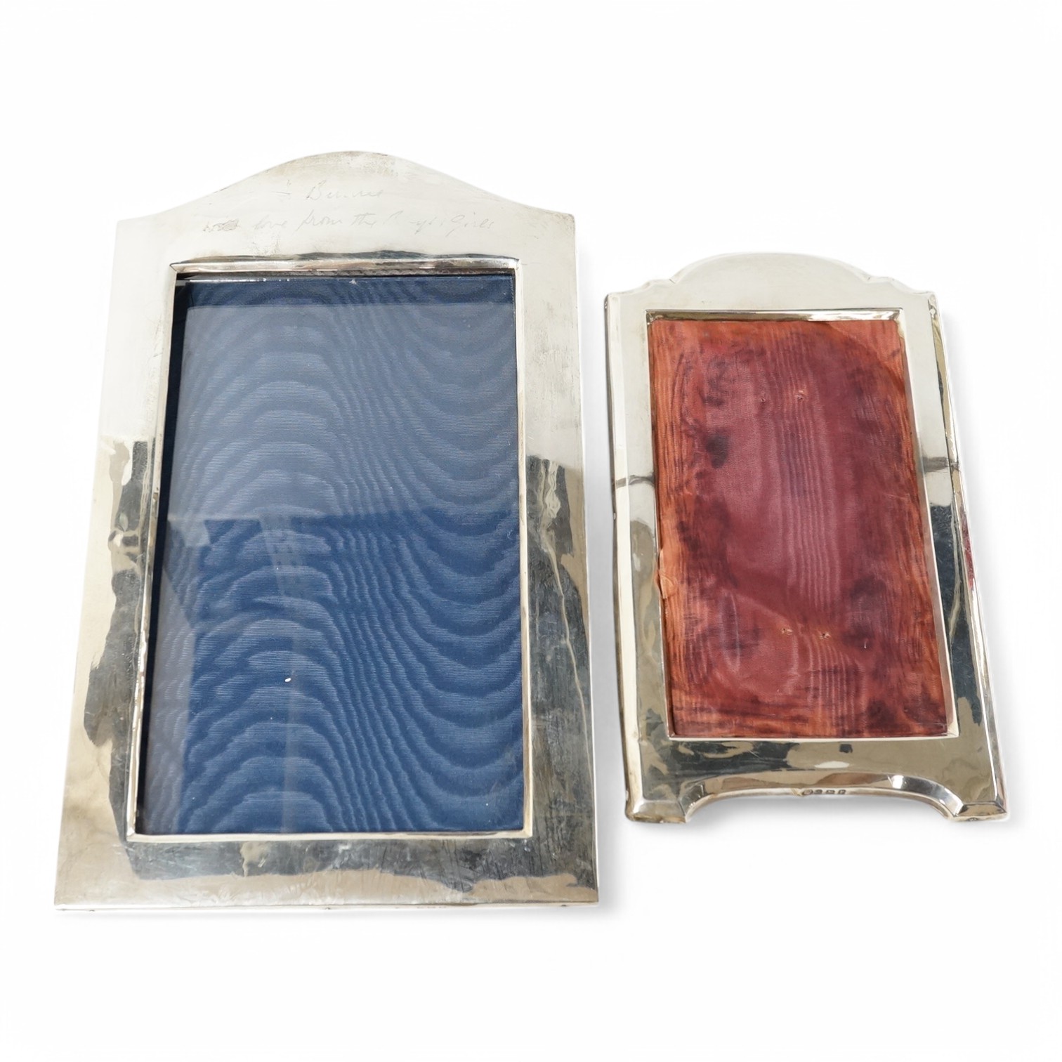 Two George V silver mounted photograph frames, Birmingham, 1916 and Birmingham, 1921, largest 34.2cm. Condition - poor to fair